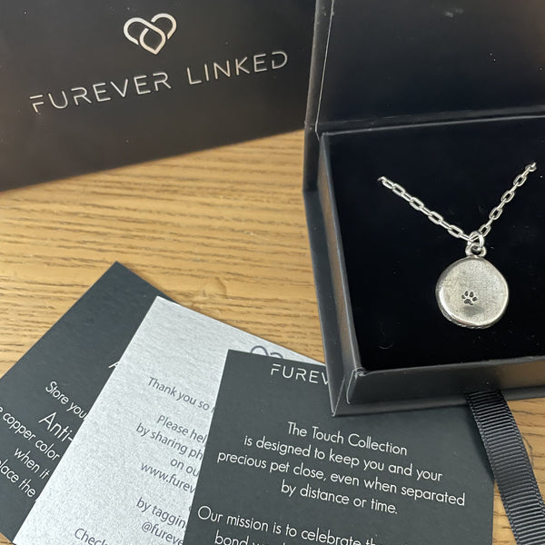 Paw print necklace