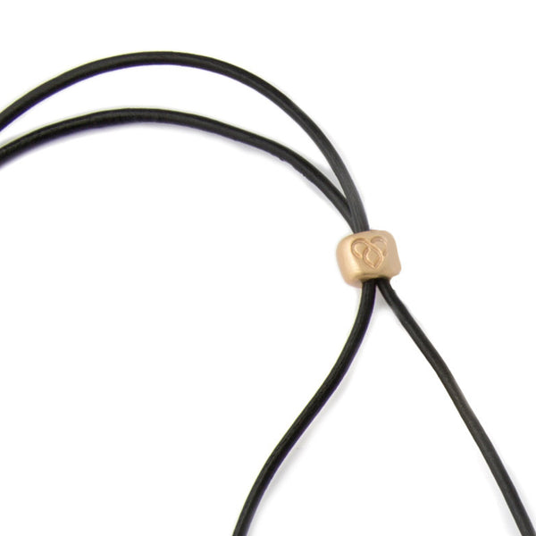Large Gold Worry Stone on Leather Cord