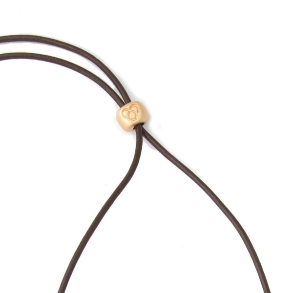 Large Gold Worry Stone on Leather Cord